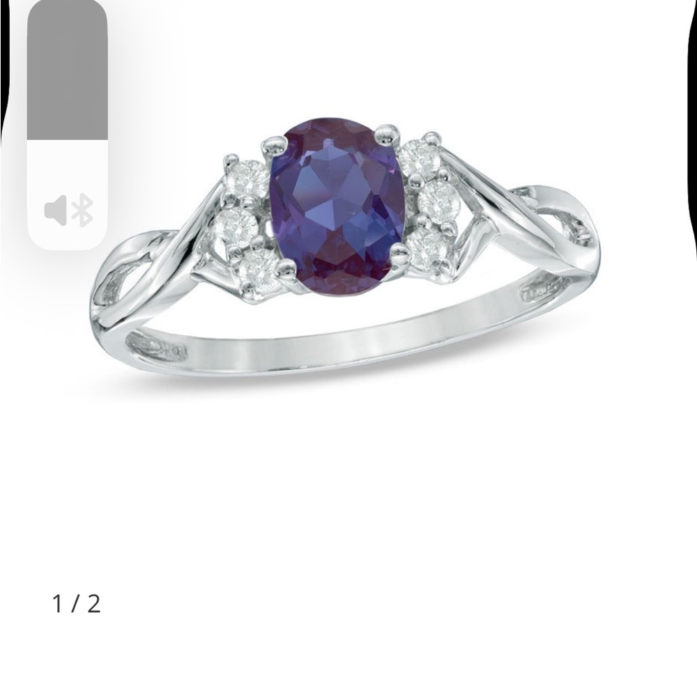 Zales Safire oval lab created gymstone with white diamonds circling s925
